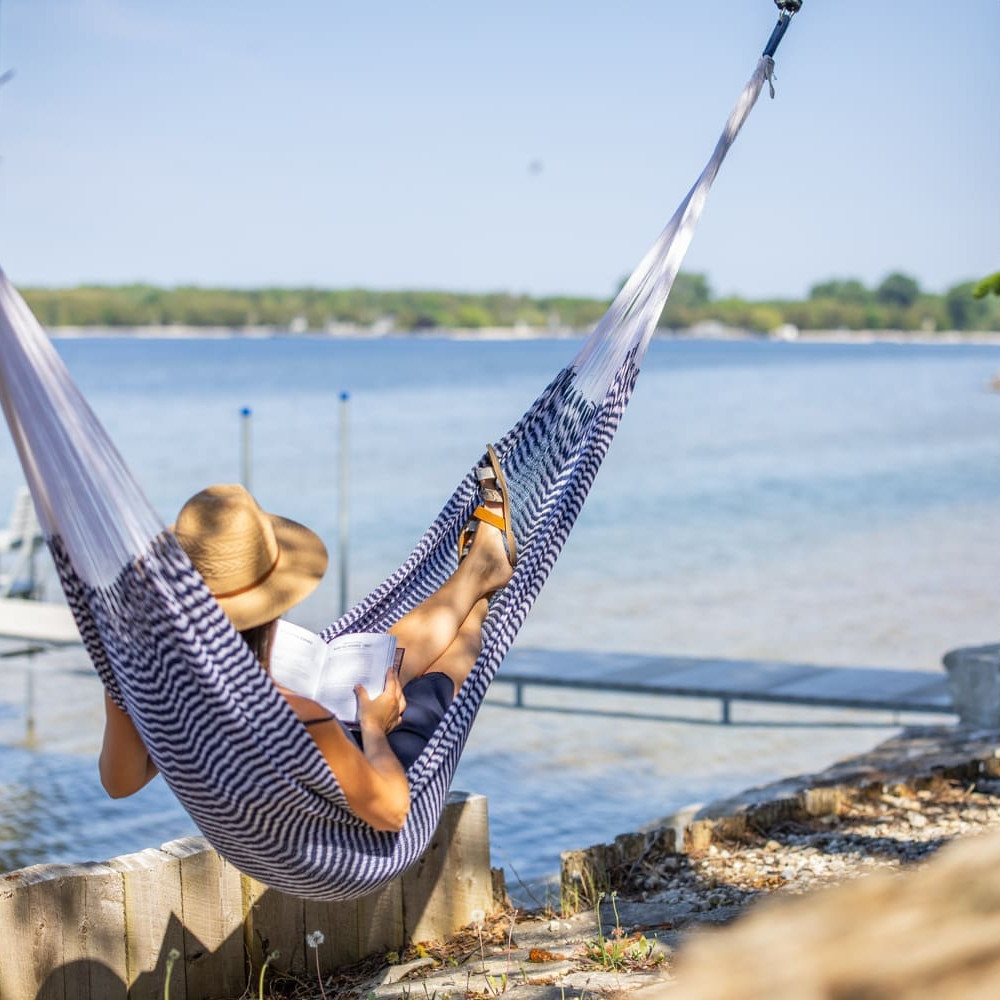 1 Picture yourself relaxing in this hammock watching the sunset over the bay.